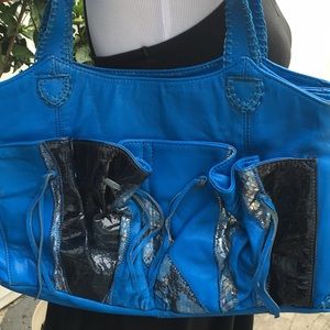chi Blue with snakeskin pockets on front